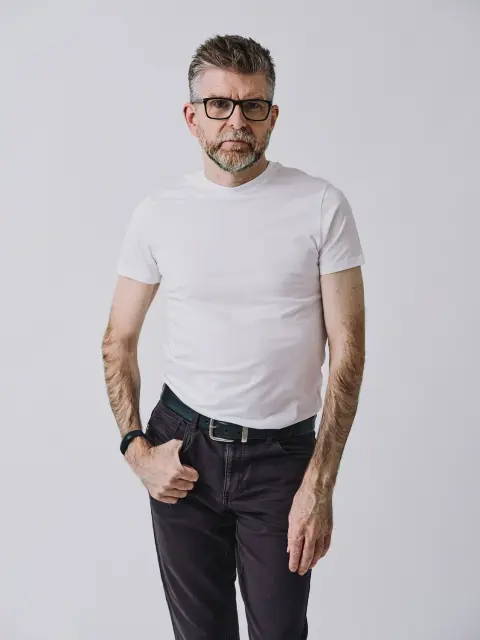 Full-length studio portrait of Phil Alderson