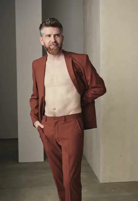 Phil Alderson modelling a rust suit